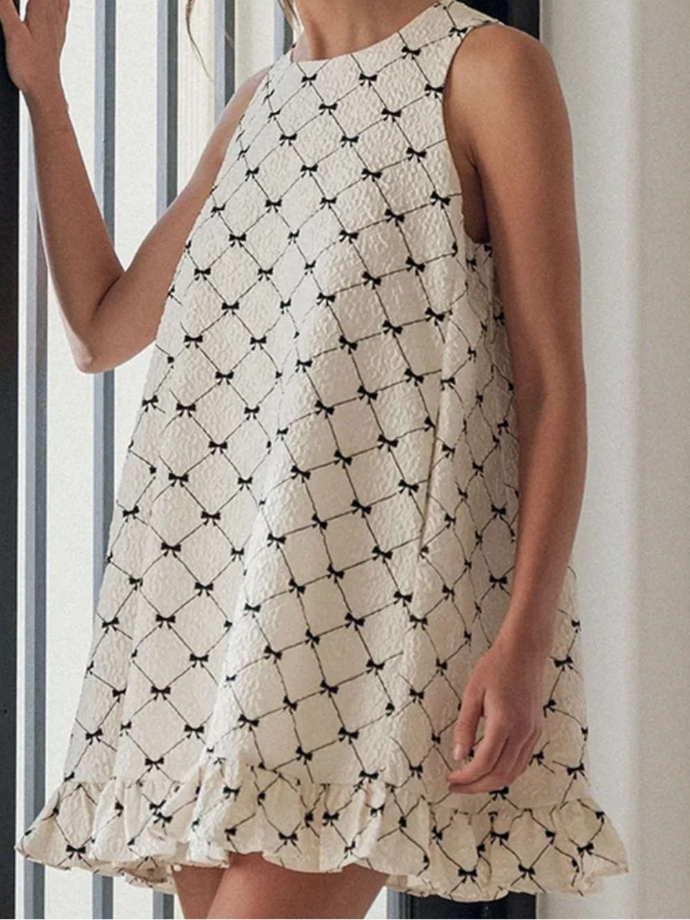 Sleeveless Cream Mini Dress with Black Lattice Print